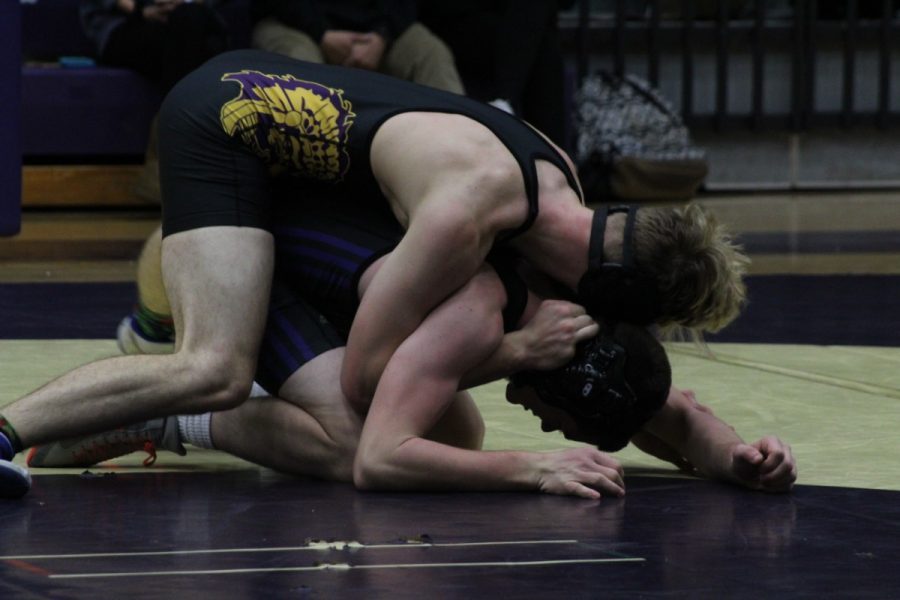CENTRALS WRESTLING TAKES TO THE MATS OVER WINTER BREAK -- A Central student wrestles a Sequatchie County student.