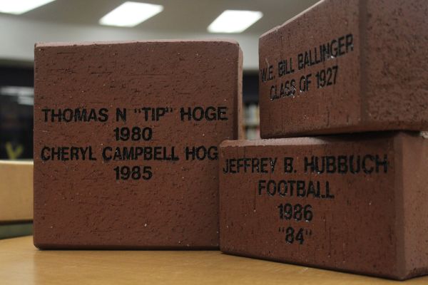 ALUMNI ASSOCIATION'S BRICK SALE CONTINUES -- The first bricks that have been ordered sit in the Central High School library.