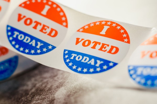 SHOULD STUDENTS BE MORE INVOLVED IN POLITICS? -- Depicted above is a roll of I voted circular stickers on a gray background for the November elections in the United States.
