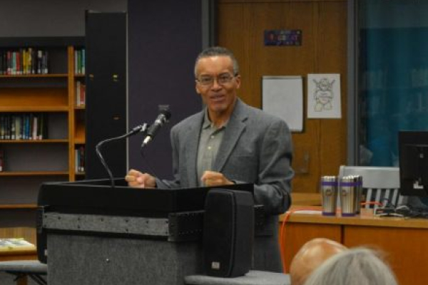 REUBEN JUSTICE, AMONG FIRST AFRICAN AMERICAN CENTRAL GRADUATES, SPEAKS TO CENTRAL HISTORY CLASSES -- Reuben Justice discusses his time at Central in the school library.