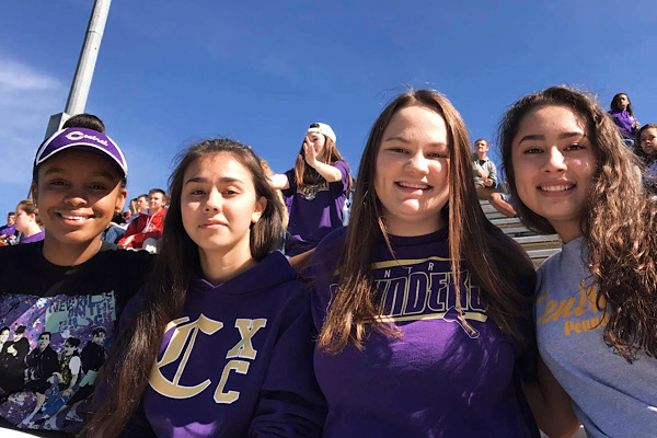 BITTERSWEET BEGINNINGS -- From left to right: DayOnna Carson, Danae Wnuk, Abby Young, and Cassandra Castillo enjoy a Powderpuff game as sophomores.