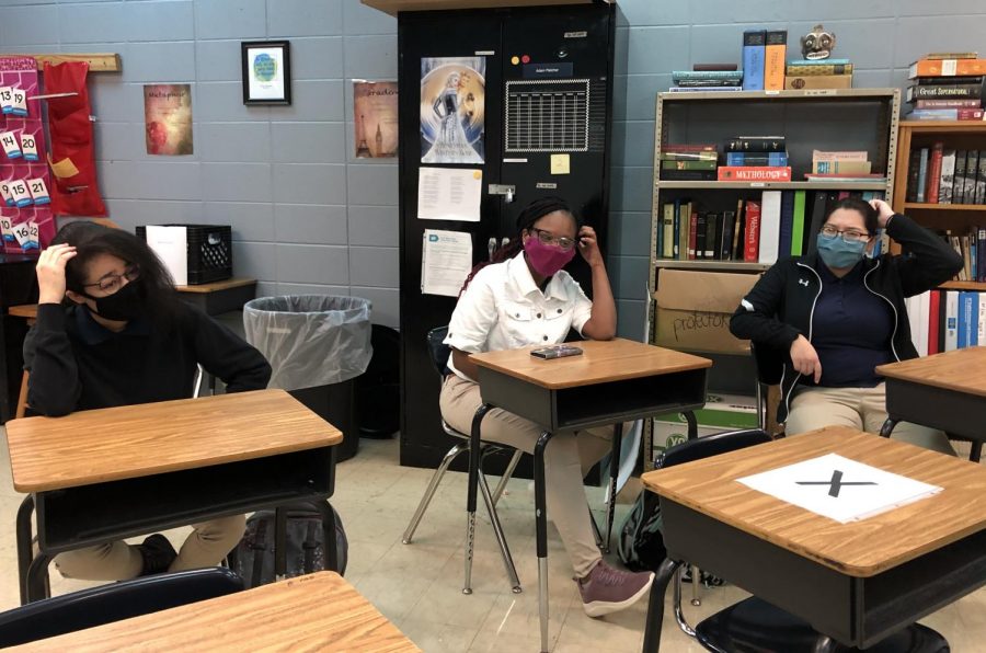 UNCERTAINTY IS CERTAIN, SO KEEP LOOKING FORWARD -- Students in Mr. Fletchers fourth period class scratch their heads in confusion.