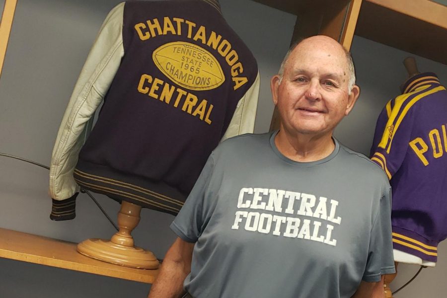 CENTRAL COMMEMORATES COACH JOHN CRAWFORD -- John Crawford is standing beside a Letterman football jacket from his graduation year.