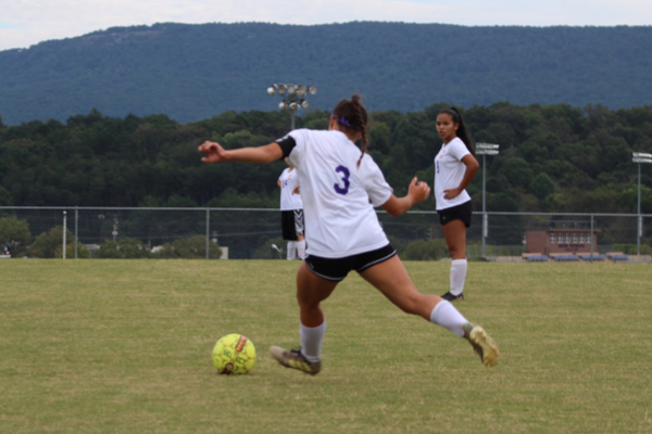 THE GIRLS SOCCER TEAM TAKES A TOUGH LOSS SEQUATCHIE -- Junior Karleigh Schwarzl kicking the ball to her teammates during the game against Sequatchie.