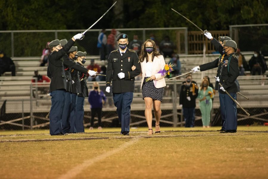 PHOTO GALLERY: HOMECOMING 2020 --Ashlee Smith is presented as a member of the 2020 Homecoming Court, escorted by Joshua Boles.