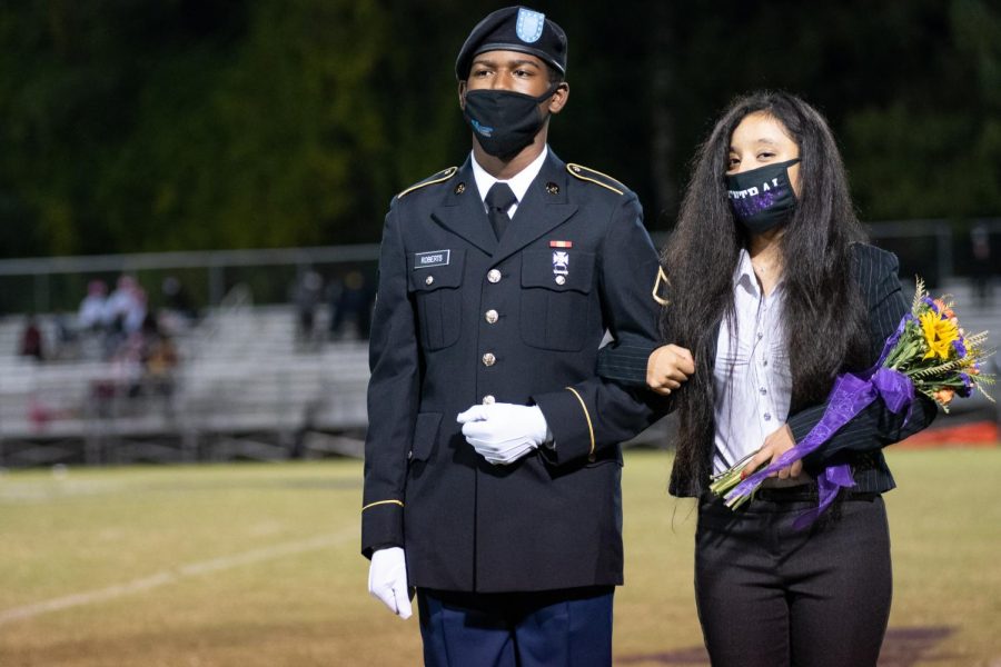 PHOTO GALLERY: HOMECOMING 2020 --Dallana Nolazco is presented as a member of the 2020 Homecoming Court, escorted by Deondree Roberts. 