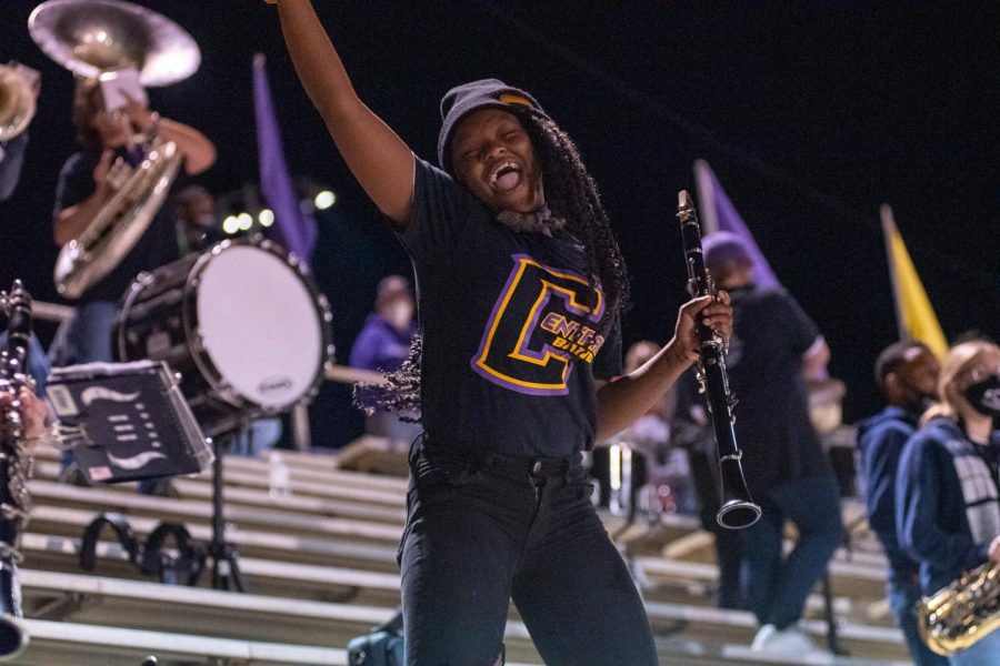 PHOTO GALLERY: HOMECOMING 2020 -- Band member Imari Parks enjoys a song playing during the football game. 