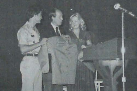 LOOKING BACK 1979-80 -- Former Governor Lamar Alexander explains his new Tennessee Tomorrow Program and is presented a Central jacket by Roger Bush and Sherri Bradford.