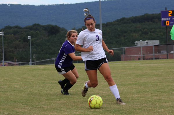 PHOTO GALLERY: CENTRAL SOCCER FOR 2020-21 SEASON -- Junior Karleigh Schwarzl dribbles the ball away in an effort to get the ball away from the opponent. 