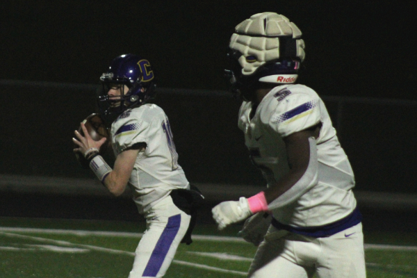 CENTRAL FOOTBALL BEGINS SPRING PRACTICE --Rising Sophomore quarterback Evan Schwarzl looks to throw to rising Senior running back, Michael Watson. 