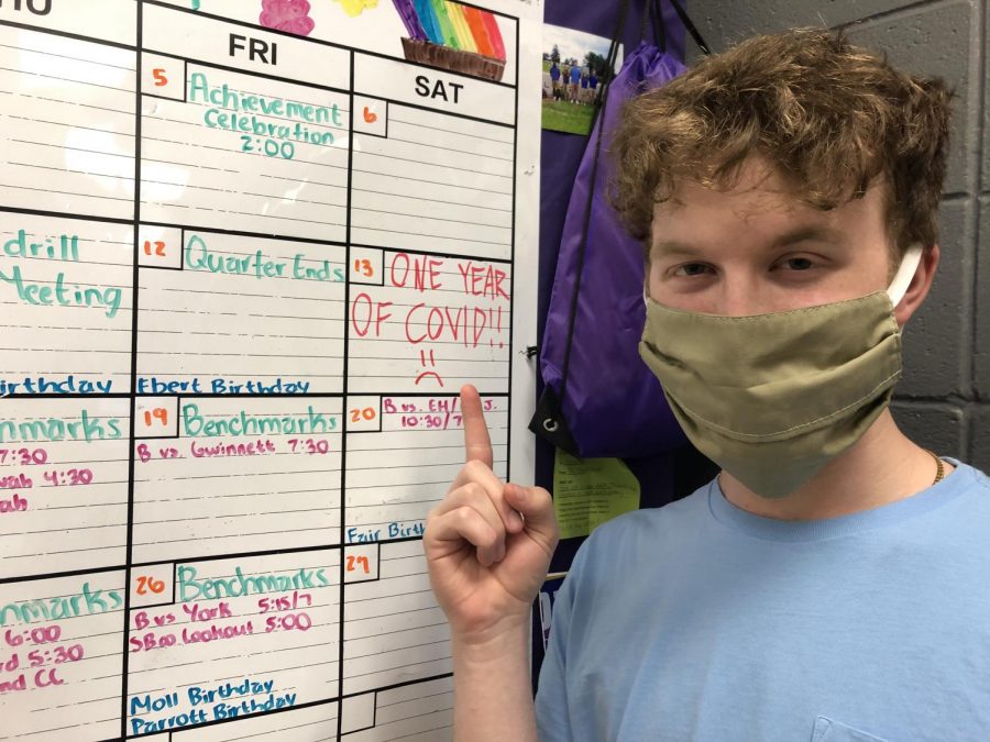 FIFTEEN DAYS? -- Grayson Catlett points to March 13 on the calendar, marking the one-year anniversary of Hamilton County schools shutting down due to COVID-19.