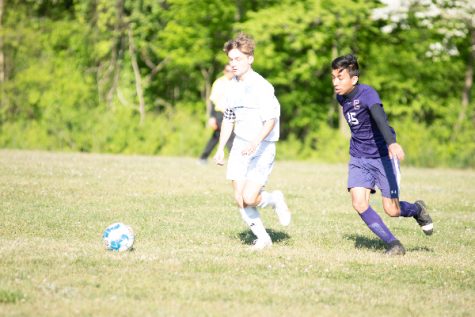 THE 2021 BOYS SOCCER SEASON COMES TO A CLOSE -- Junior, Luis Fransisco dribbles past his opponent. 