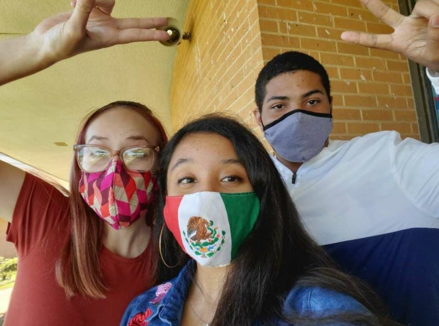 ZOEY GREENE: DON'T WASTE HIGH SCHOOL MOMENTS -- Senior Staff Writer Zoey Greene (left) enjoys Leadership class with friends Dallana Nolasco (middle) and Jahmes Richardson (right). 