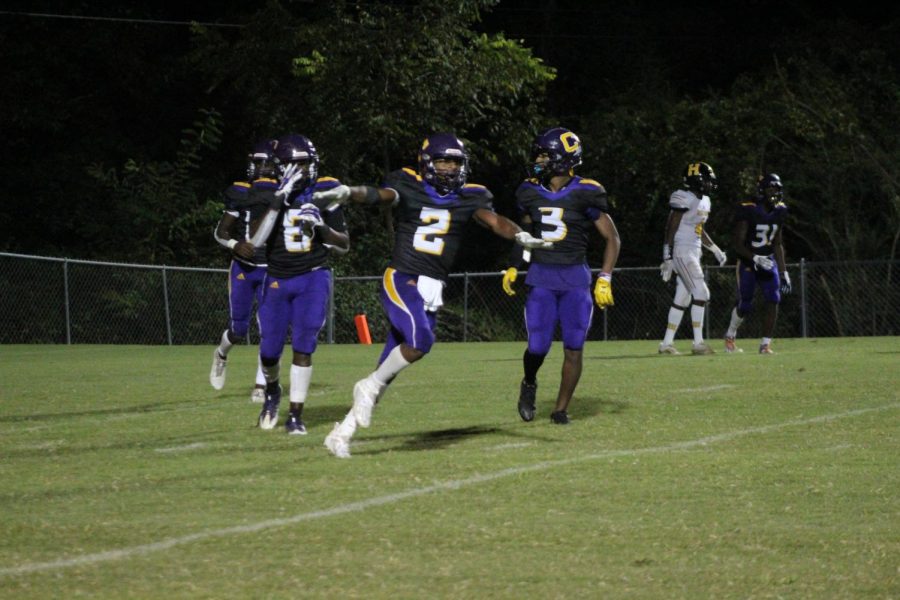 EXTRA INNINGS: DEFENSE PLAYS KEY ROLE IN POUNDERS THREE GAME WIN STREAK -- The Central defense celebrating after making a goal line stand vs. HIxson. 