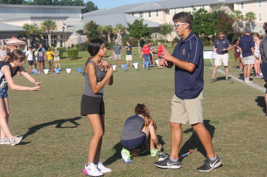 JARED EDDY COACHING AT A CROSS COUNTRY MEET