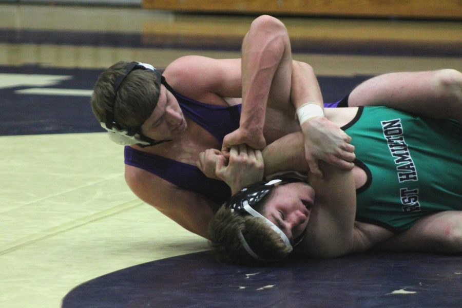 CENTRAL BOYS WRESTLING TEAM TAKE ON HIXSON AND EAST HAMILTON; GIRLS FACE OFF IN LADY PATRIOT TOURNAMENT -- Junior wrestler, Randall Gray curls his opponent up for the pin. 