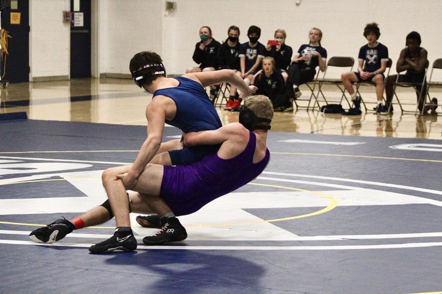 THE WRESTLING TEAM TRAVELS TO ST. ANDREWS SEWANEE - Sophomore Wrestler, Jesse Fowler brings his opponent down to the mat.