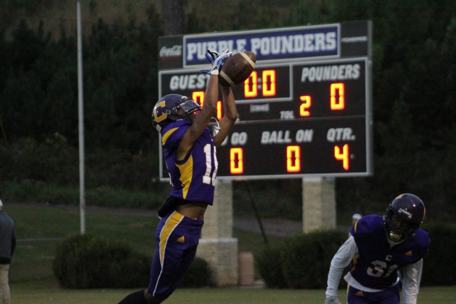 2021-2022 FOOTBALL SEASON GALLERY -- Central pounder catching the ball to score a touchdown.