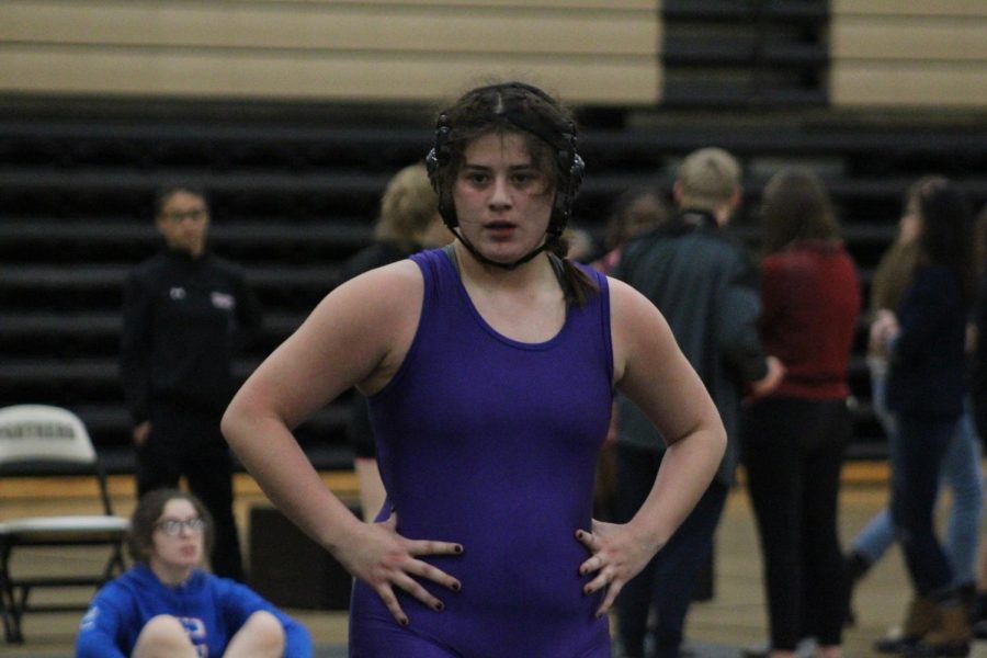 THE+WRESTLING+TEAM+CONCLUDES+THE+SEASON+COMPETING+IN+THE+REGION%2C+SECTIONAL%2C+AND+STATE+TOURNAMENTS+-+Junior+Gabby+Gray+stands+waiting+for+her+opponent.
