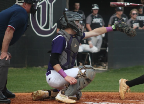 BASEBALL SECURES WINS AGAINST LOOKOUT VALLEY -- Catcher Luke Keown in position after the pitcher launched the ball.  
