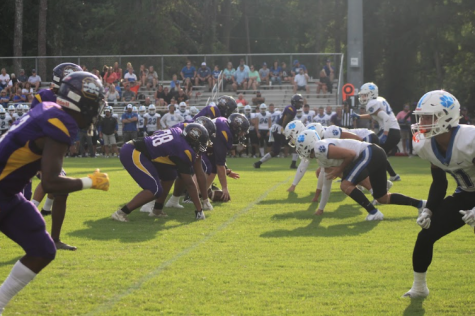 FOOTBALL TEAM STARTS STRONG WITH A WIN AGAINST CAMPBELL COUNTY -- 2022-2023 Football team lined up 