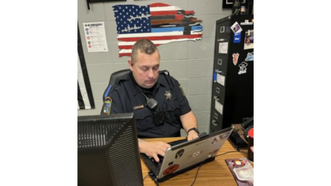 NEW TENNESSEE CODING ANNOTATED BILL BANS RECORDING FIGHTS -- School Resource Officer, AJ Giradot working in his office.  