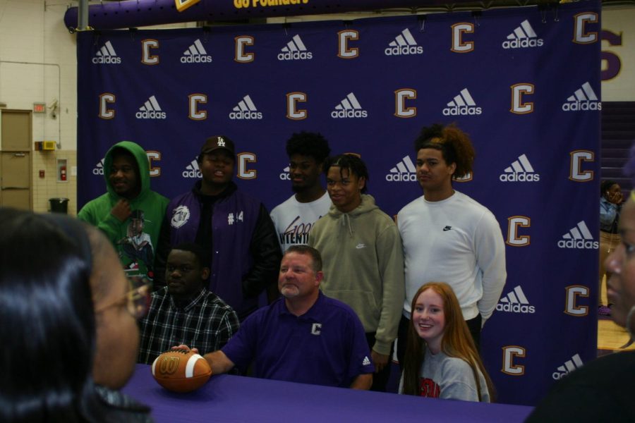 CENTRAL HONORS EIGHT VARSITY ATHLETES AT SIGNING DAY CELEBRATION -- Coach Jones and the eight varsity athletes who were honored at the signing day celebration. 